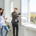 Real,Estate,Agent,Shows,New,Home.,Male,Realtor,Shows,Apartment